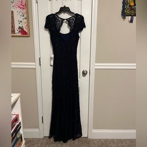 Navy blue gown by Jump Apparel size 5/6.
